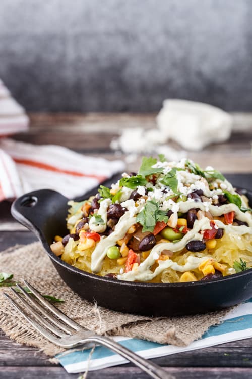 southwestern style spaghetti squash bowl with avocado crema