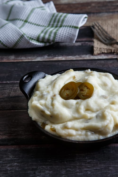 gluten-free spicy mashed cauliflower with pickled jalapeno