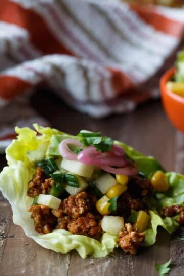 Cinammon Chili Pork Lettuce Wraps with Apple Corn Salsa, Avocado, and Pickled Onions | sharedappetite.com