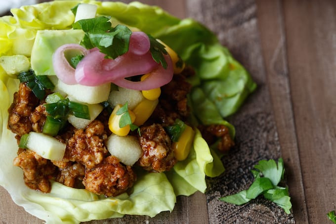 Cinammon Chili Pork Lettuce Wraps with Apple Corn Salsa, Avocado, and Pickled Onions | sharedappetite.com