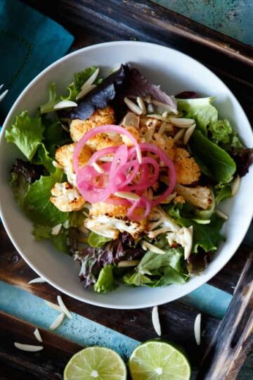 Honey Sriracha Cauliflower Salad with Pickled Onions + Avocado Yogurt Dressing | sharedappetite.com