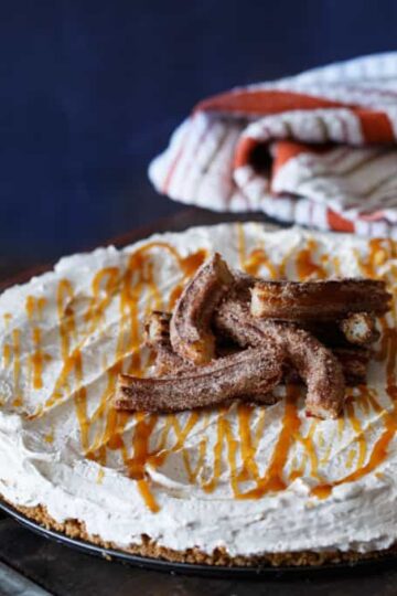 No Bake Churro Cheesecake with Cinnamon Toast Crunch Crust | sharedappetite.com
