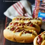 Bacon Wrapped Brats with Cheddar-Beer Sauce and Sriracha | sharedappetite.com