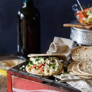 Healthy Mini Vegetarian Greek Sliders with Hummus, Israeli Salad, Pickled Cabbage, and Tahini Sauce | sharedappetite.com