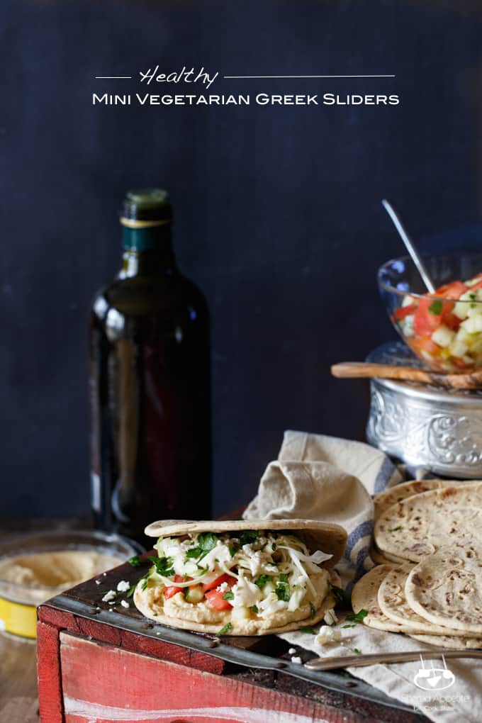 Healthy Mini Vegetarian Greek Sliders with Hummus, Israeli Salad, Pickled Cabbage, and Tahini Sauce | sharedappetite.com