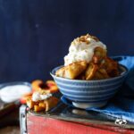 Peach Cobbler Wontons with Bourbon Whipped Cream | sharedappetite.com