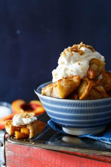 Peach Cobbler Wontons with Bourbon Whipped Cream | sharedappetite.com