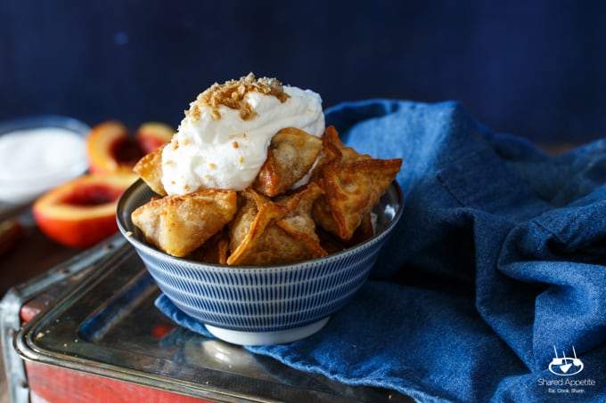 Peach Cobbler Wontons with Bourbon Whipped Cream | sharedappetite.com