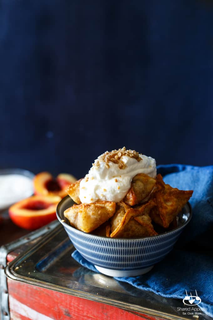 Peach Cobbler Wontons with Bourbon Whipped Cream | sharedappetite.com