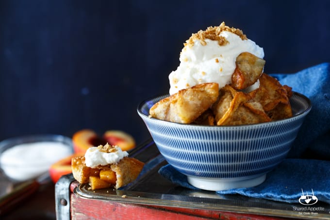 Peach Cobbler Wontons with Bourbon Whipped Cream | sharedappetite.com