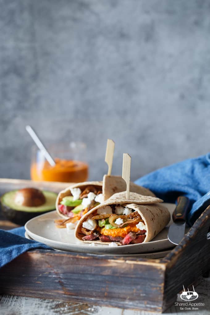 Steak, Romesco, and Goat Cheese Wrap with Avocado and Crispy Shallots | sharedappetite.com