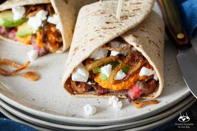 Steak, Romesco, and Goat Cheese Wrap with Avocado and Crispy Shallots | sharedappetite.com