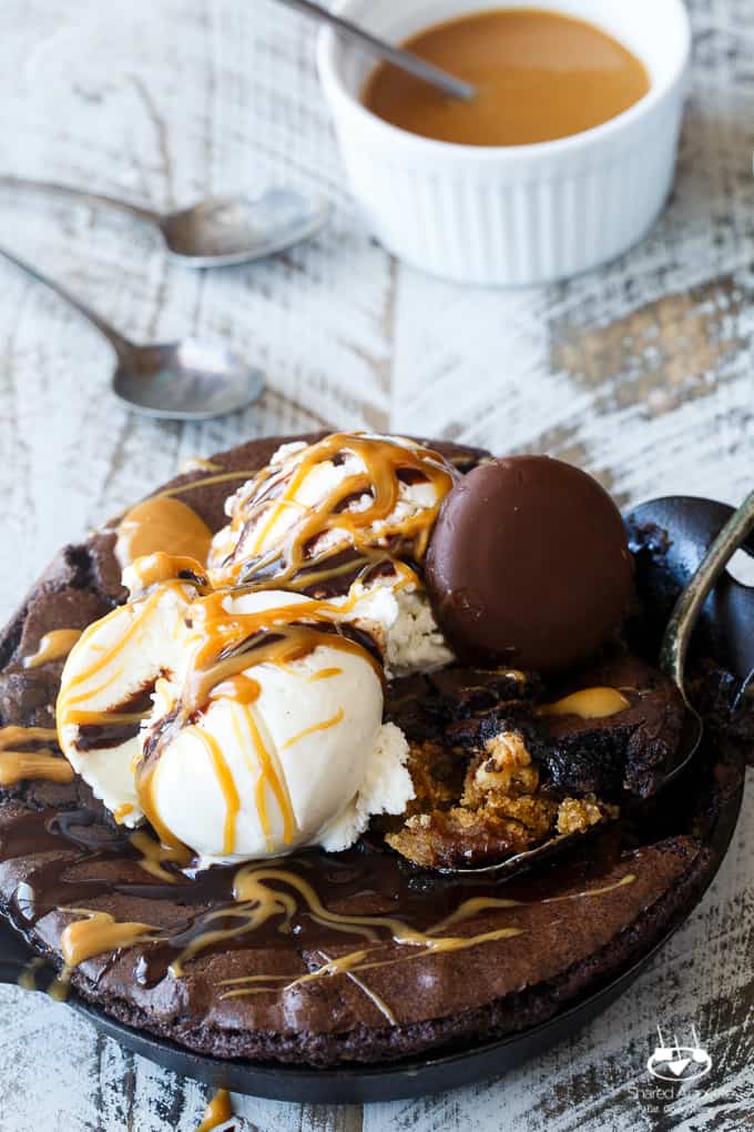 Skillet Chocolate Peanut Butter Cookie Tagalong Brownie Sundaes | sharedappetite.com A great way to feature those girl scout cookies in an epic dessert mashup of half cookie, half brownie goodness!