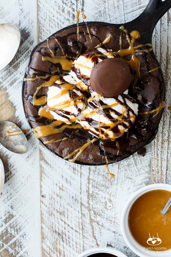 Skillet Chocolate Peanut Butter Cookie Tagalong Brownie Sundaes | sharedappetite.com A great way to feature those girl scout cookies in an epic dessert mashup of half cookie, half brownie goodness!