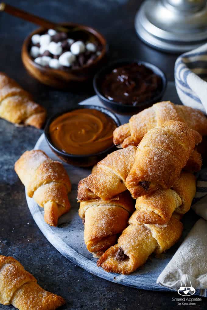 Baked S'mores Churro Bites | sharedappetite.com Ready within 15 minutes, these cinnamon sugar crescent rolls are stuffed with mini marshmallows and chocolate chips!