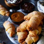 Baked S'mores Churro Bites | sharedappetite.com Ready within 15 minutes, these cinnamon sugar crescent rolls are stuffed with mini marshmallows and chocolate chips!