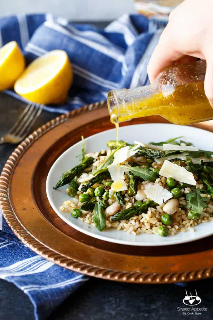 Gluten Free Spring Pea and Asparagus Brown Rice Salad with freshly shaved Parmigiana Reggiano and a bright Lemon Vinaigrette | sharedappetite.com A perfect light and fresh vegetarian meal that's portable and great hot or cold!