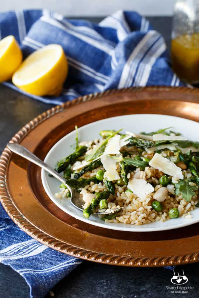 Gluten Free Spring Pea and Asparagus Brown Rice Salad with freshly shaved Parmigiana Reggiano and a bright Lemon Vinaigrette | sharedappetite.com A perfect light and fresh vegetarian meal that's portable and great hot or cold!