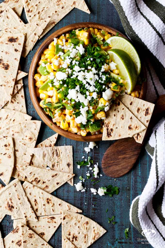 Mexican Street Corn and Avocado Dip | sharedappetite.com All the flavor of traditional Mexican Street Corn, transformed into an easy entertaining summer appetizer dip recipe!