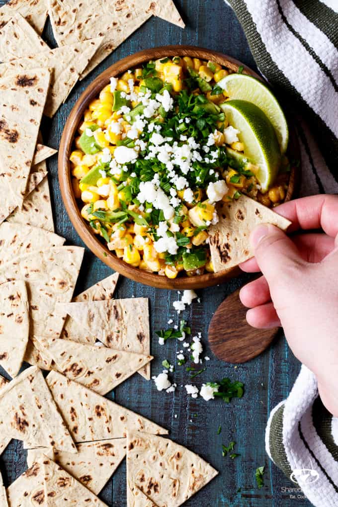 Mexican Street Corn and Avocado Dip | sharedappetite.com All the flavor of traditional Mexican Street Corn, transformed into an easy entertaining summer appetizer dip recipe!