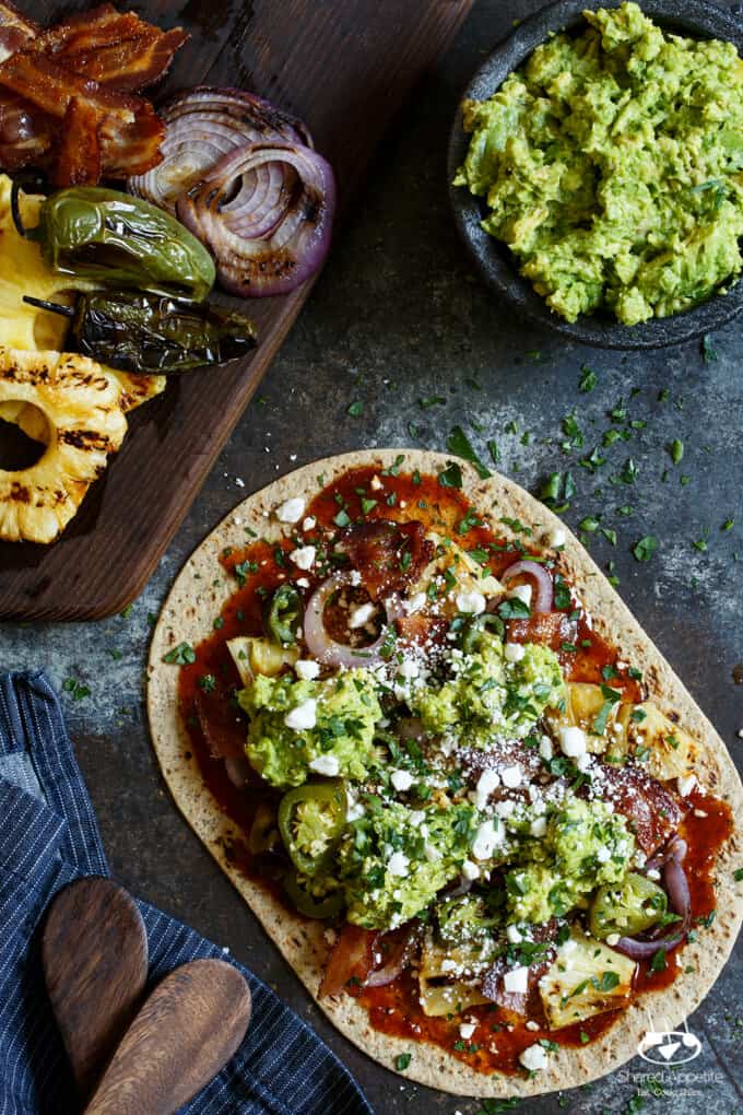 Grilled Spicy Pineapple, Bacon, and Avocado Flatbread with BBQ Sauce, Grilled Onions, and Charred Jalapenos | sharedappetite.com