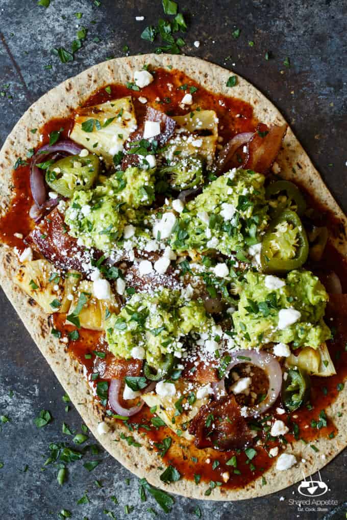 Grilled Spicy Pineapple, Bacon, and Avocado Flatbread with BBQ Sauce, Grilled Onions, and Charred Jalapenos | sharedappetite.com