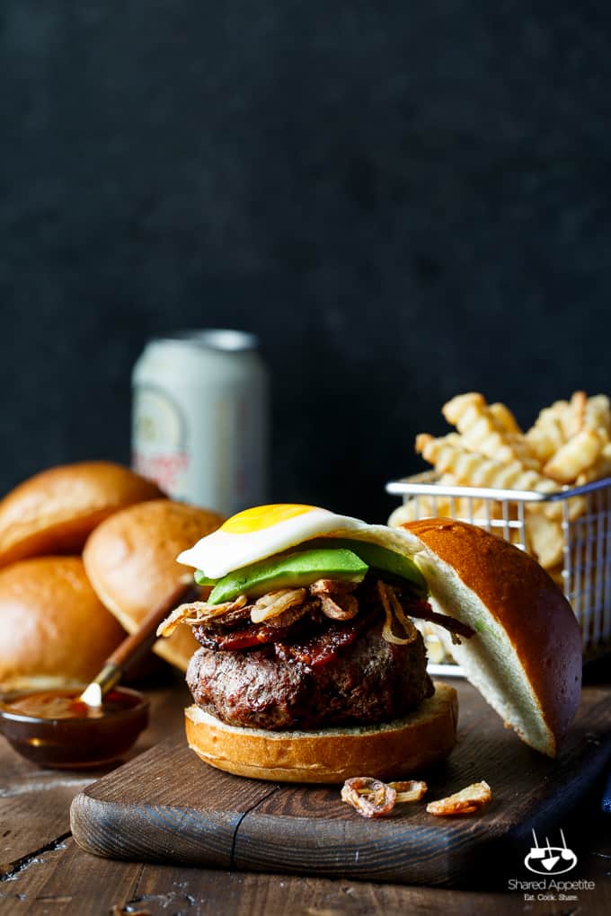 Whiskey Glazed Burgers with Spicy Brown Sugar Bacon, Avocado, Crispy Shallots, and a Fried Egg! A perfect Father's Day EPIC burger | sharedappetite.com