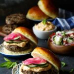 Lamb Kefta Burgers with Spicy Whipped Feta, Pickled Onions, and Cucumber | sharedappetite.com