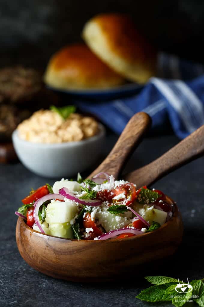 Lamb Kefta Burgers with Spicy Whipped Feta, Pickled Onions, and Cucumber | sharedappetite.com