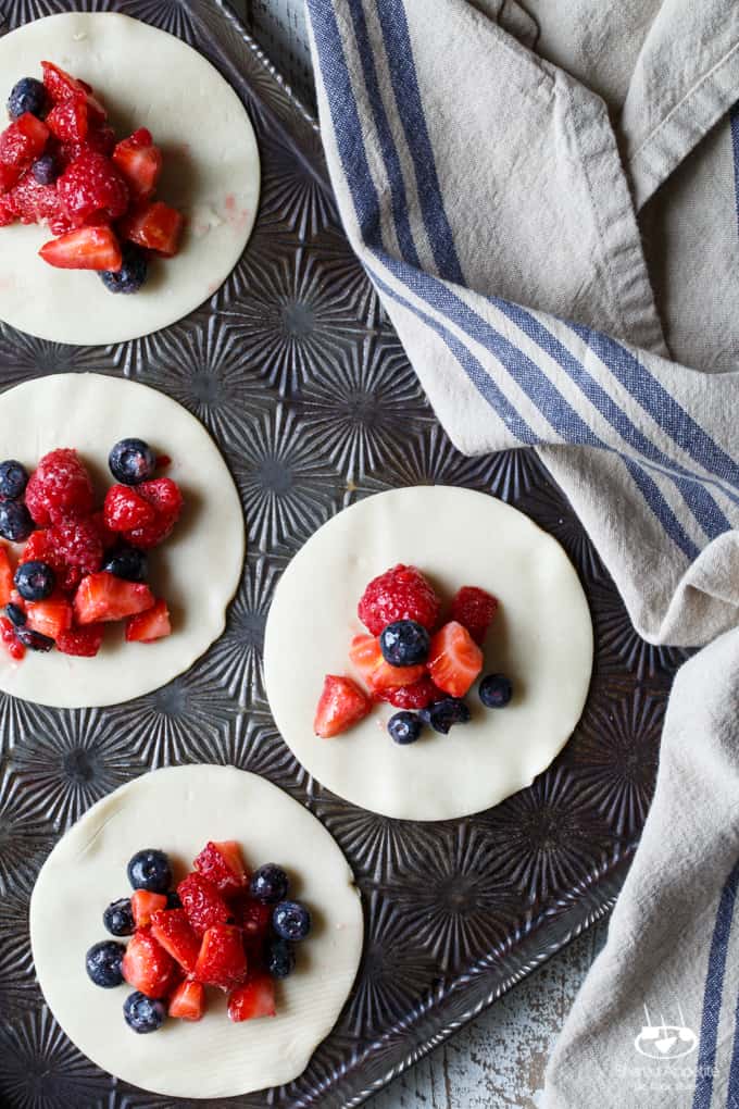 Mini Berry Galettes with Lemon Whipped Cream | sharedappetite.com