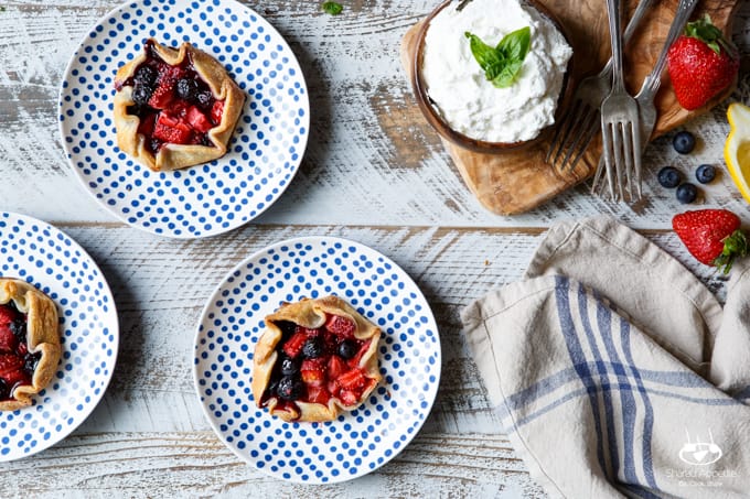 Mini Berry Galettes with Lemon Whipped Cream | sharedappetite.com