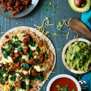 Southwest Chorizo Breakfast Quesadillas | sharedappetite.com A protein-packed breakfast quesadilla with eggs, cheese, chorizo, spinach, and beans!