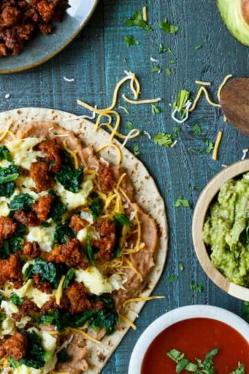Southwest Chorizo Breakfast Quesadillas | sharedappetite.com A protein-packed breakfast quesadilla with eggs, cheese, chorizo, spinach, and beans!