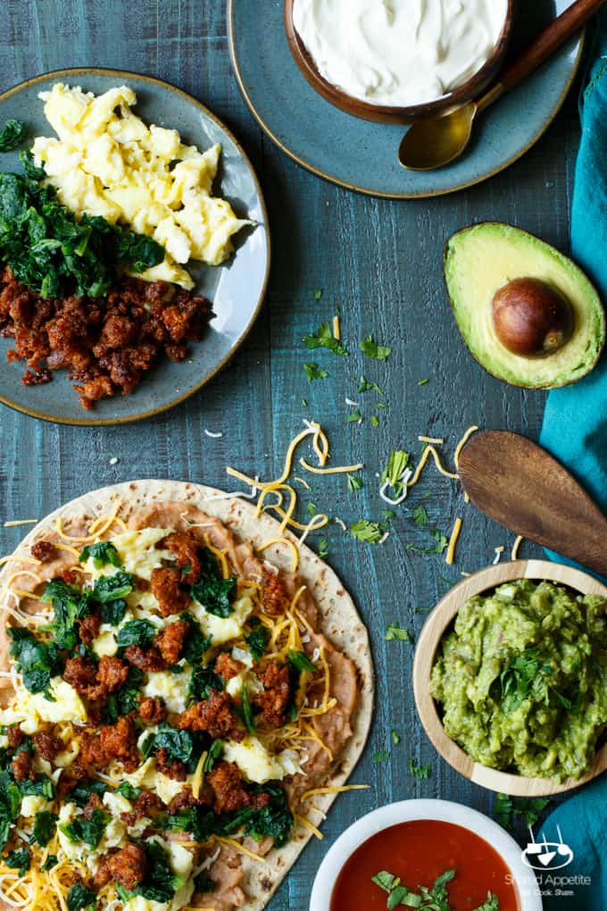 Southwest Chorizo Breakfast Quesadillas | sharedappetite.com A protein-packed breakfast quesadilla with eggs, cheese, chorizo, spinach, and beans!