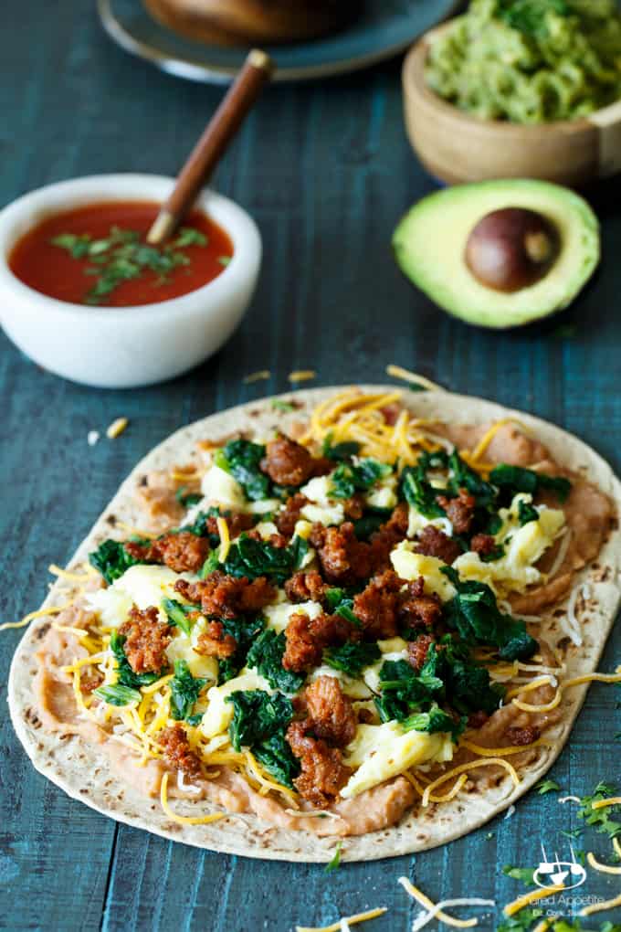 Southwest Chorizo Breakfast Quesadillas | sharedappetite.com A protein-packed breakfast quesadilla with eggs, cheese, chorizo, spinach, and beans!