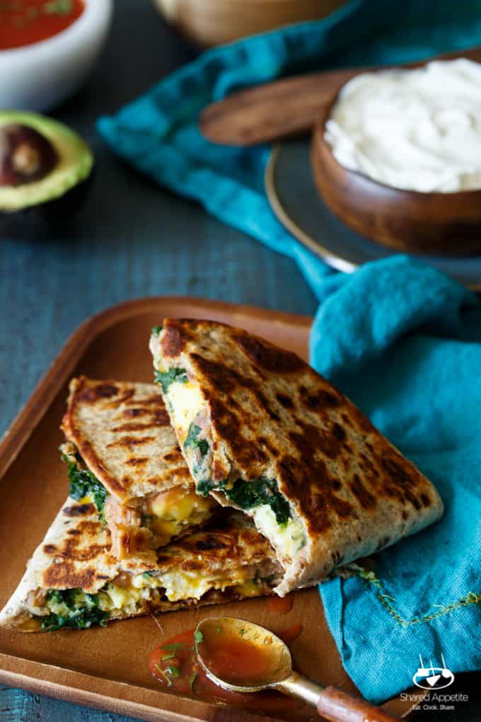 Southwest Chorizo Breakfast Quesadillas | sharedappetite.com A protein-packed breakfast quesadilla with eggs, cheese, chorizo, spinach, and beans!