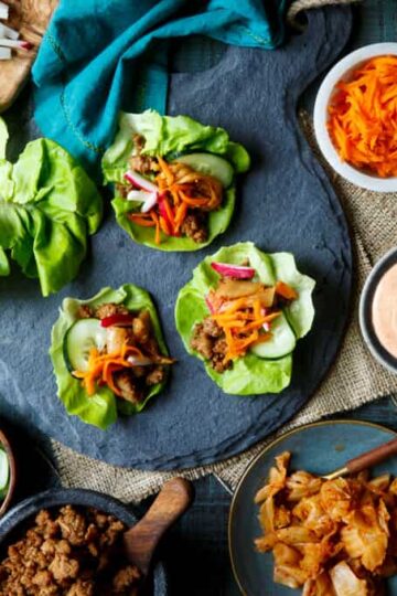 Korean Turkey Lettuce Wraps with Kimchi, Pickled Carrots, Quick Pickled Cucumbers, Radish, and Gochujang Aioli | sharedappetite.com