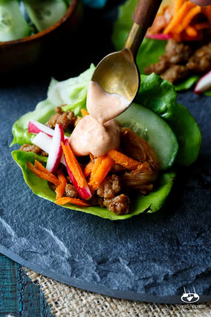 Korean Turkey Lettuce Wraps with Kimchi, Pickled Carrots, Quick Pickled Cucumbers, Radish, and Gochujang Aioli | sharedappetite.com
