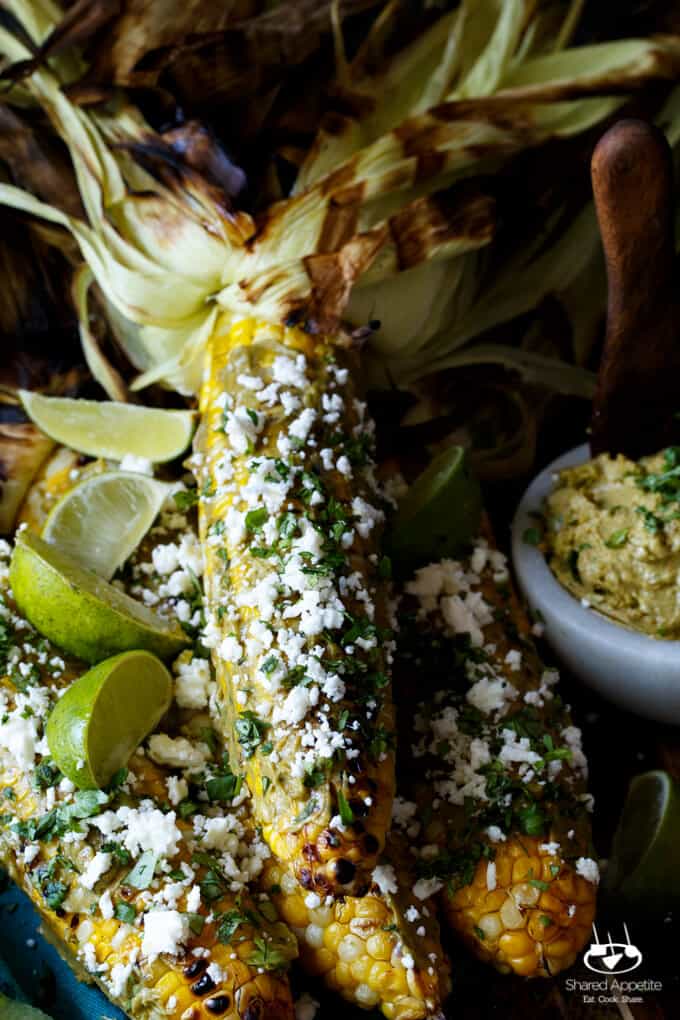 Roasted Corn with Sriracha Avocado Butter, Queso Fresco, and Cilantro | sharedappetite.com