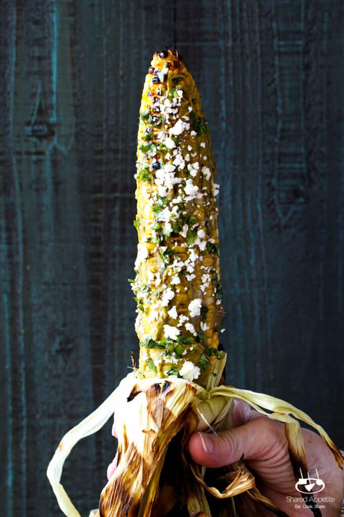 Roasted Corn with Sriracha Avocado Butter, Queso Fresco, and Cilantro | sharedappetite.com