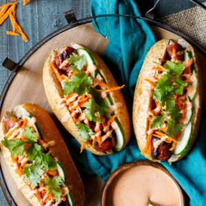 Spiral Cut Sausage Bánh mì with turkey sausage, pickled carrots, cucumber, sriracha mayo, and cilantro | sharedappetite.com