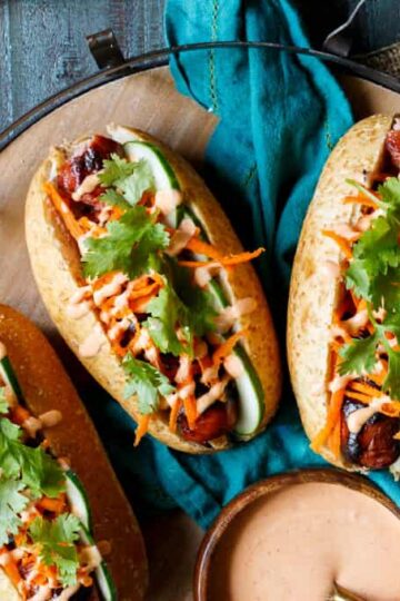 Spiral Cut Sausage Bánh mì with turkey sausage, pickled carrots, cucumber, sriracha mayo, and cilantro | sharedappetite.com