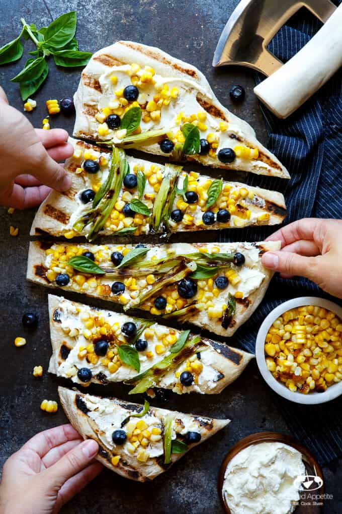 Summer Corn and Blueberry Grilled Pizza with Whipped Goat Cheese and Grilled Scallions. Super quick and easy, perfect for summer easy entertaining! | sharedappetite.com