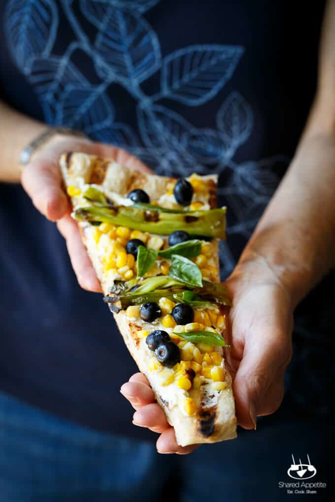 Summer Corn and Blueberry Grilled Pizza with Whipped Goat Cheese and Grilled Scallions. Super quick and easy, perfect for summer easy entertaining! | sharedappetite.com