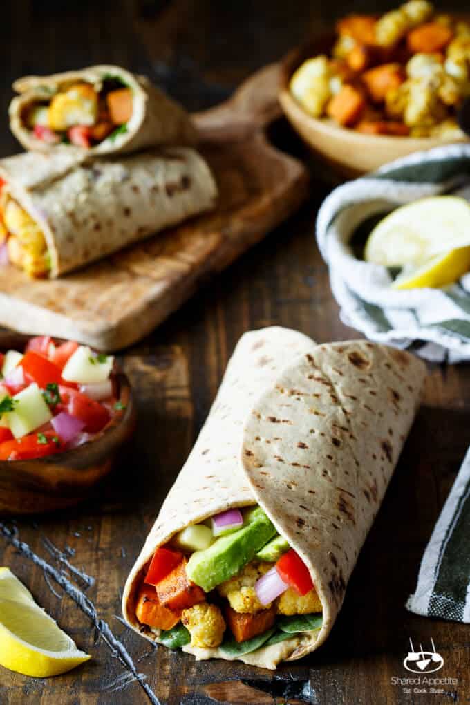 Vegan Curried Cauliflower and Sweet Potato Wrap with Hummus, Avocado, and Israeli Salad | sharedappetite.com