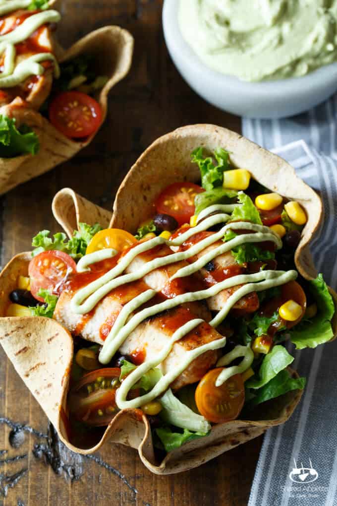 Southwest BBQ Chicken Taco Salad with Avocado Greek Yogurt Dressing | sharedappetite.com