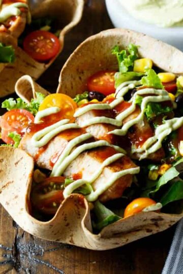 Southwest BBQ Chicken Taco Salad with Avocado Greek Yogurt Dressing | sharedappetite.com