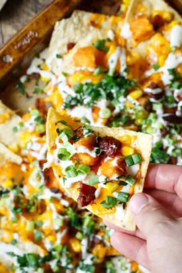 Honey BBQ Chicken Nachos with Bacon, Scallions, Corn, and Ranch Dressing | sharedappetite.com