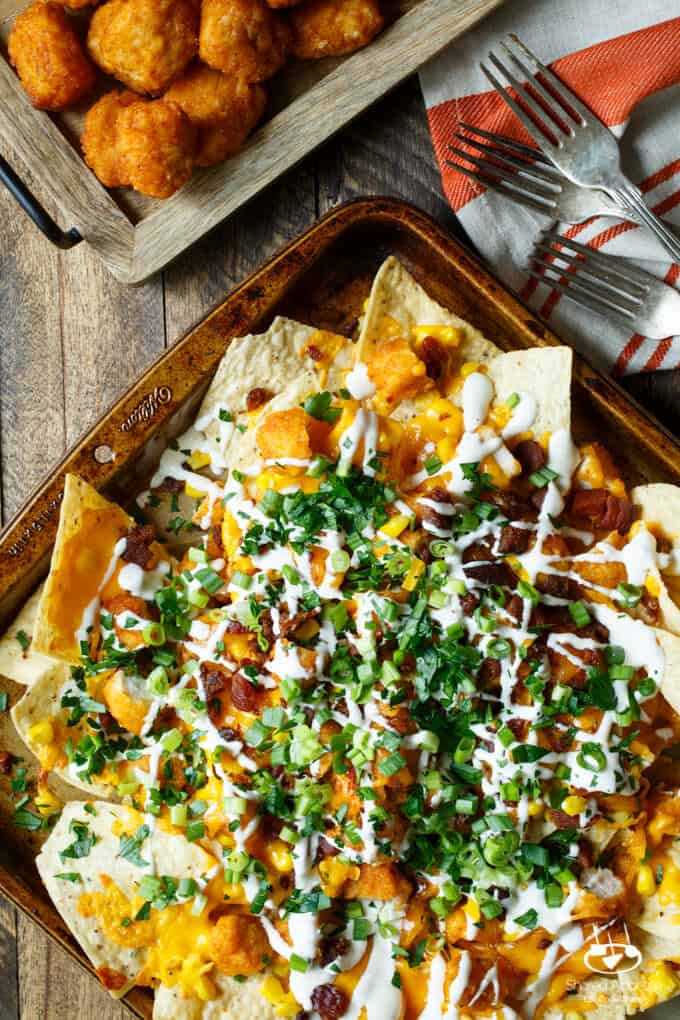 Honey BBQ Chicken Nachos with Bacon, Scallions, Corn, and Ranch Dressing | sharedappetite.com