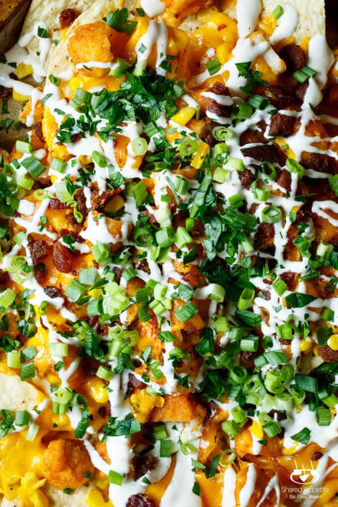 Honey BBQ Chicken Nachos with Bacon, Scallions, Corn, and Ranch Dressing | sharedappetite.com